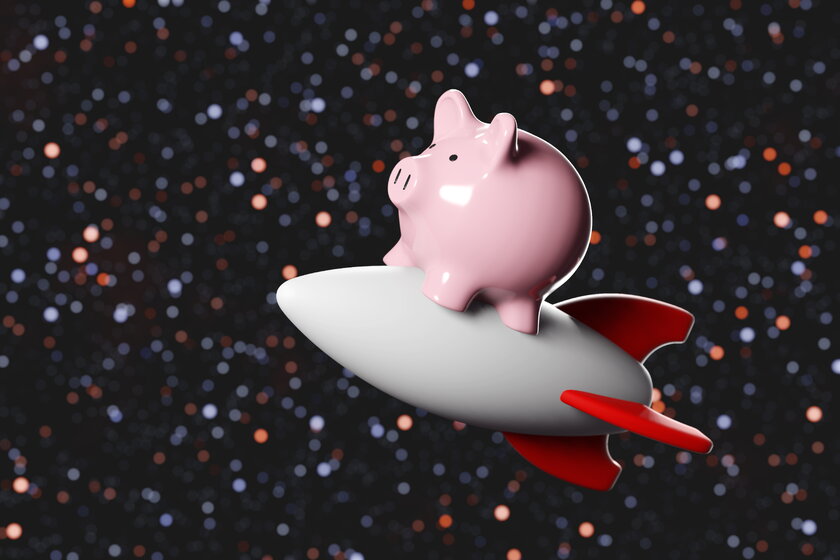 Sparschwein reitet auf Rakete durch den Weltraum.